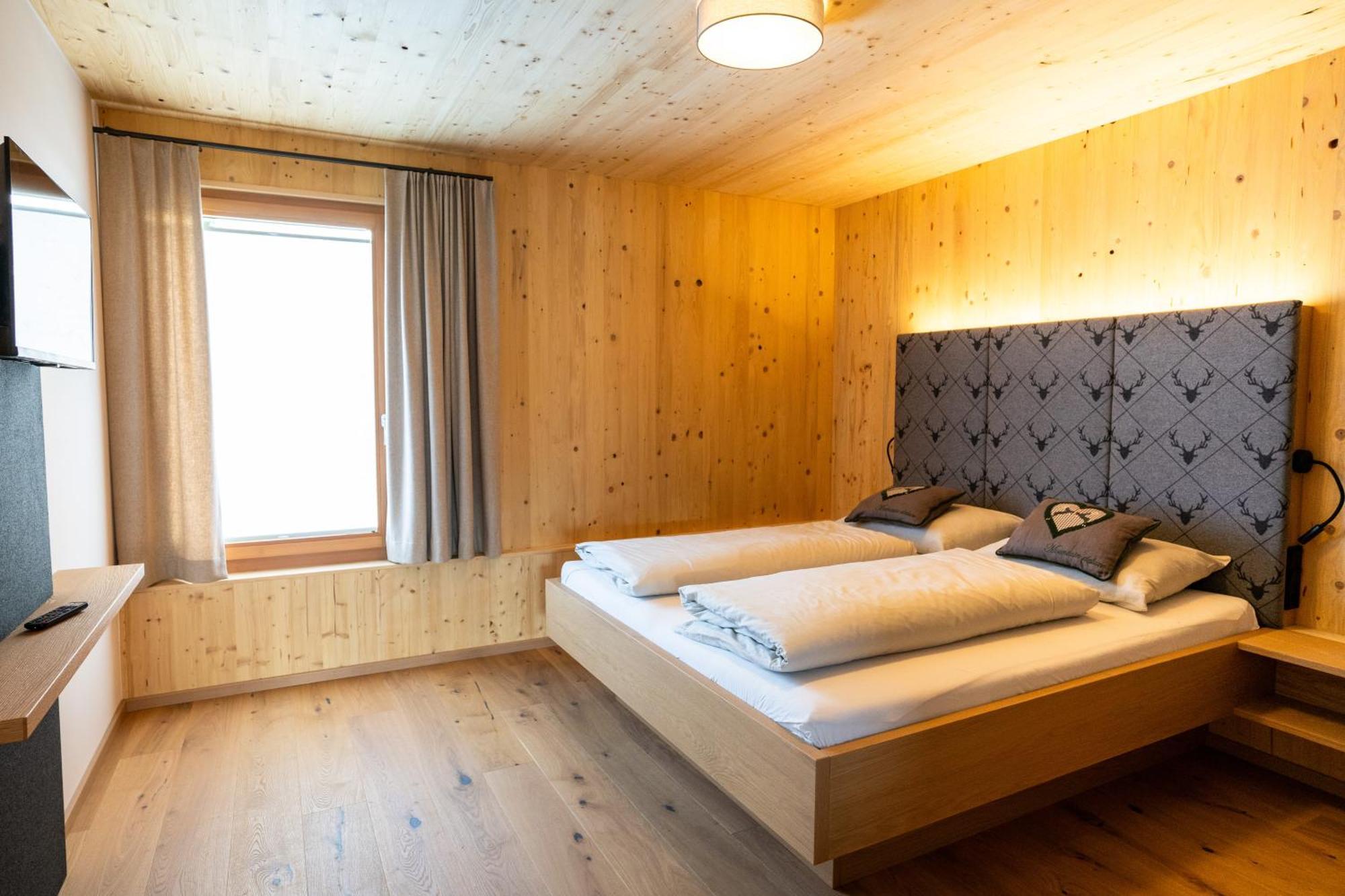 Appartement Holzhaus "Zum Schwarz'N" à Aurach am Hongar Extérieur photo